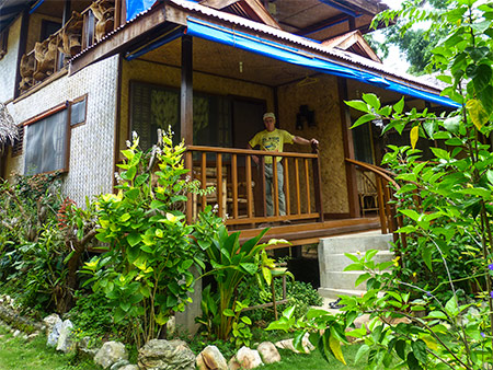 Fan room with balcony over main garden Fan room with balcony over main garden