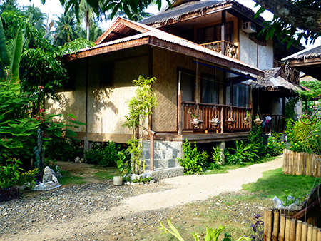 Fan room with balcony over back garden